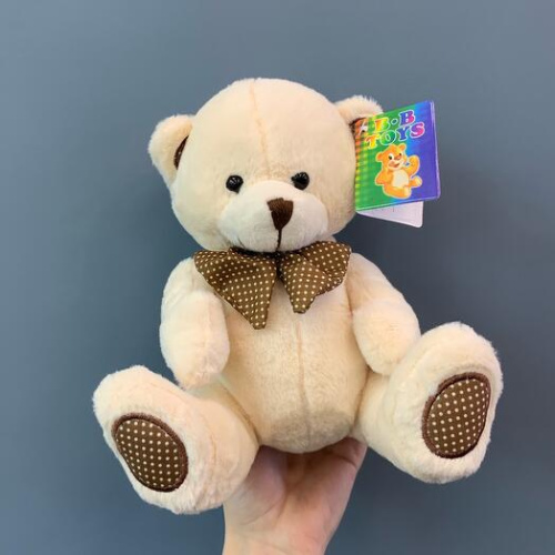 Игрушка Мишка плюшевый с бантом 18 см. средний арт. 84077